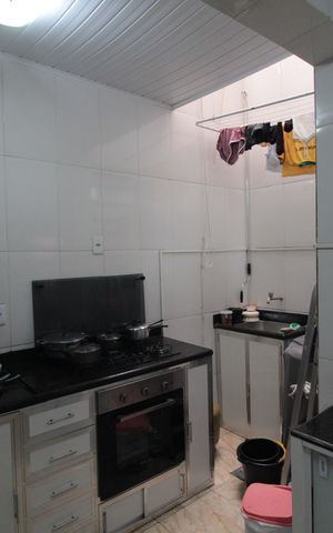Casa de condomínio à venda com 70m², 2 quartos e 1 vagaCozinha e Área de Serviço