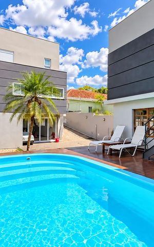 Casa à venda com 317m², 4 quartos e 6 vagas Casa à venda com 317m², 4 quartos e 6 vagasÁrea externa