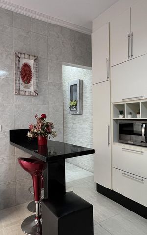 Casa à venda com 125m², 4 quartos e 2 vagas Casa à venda com 125m², 4 quartos e 2 vagasCozinha