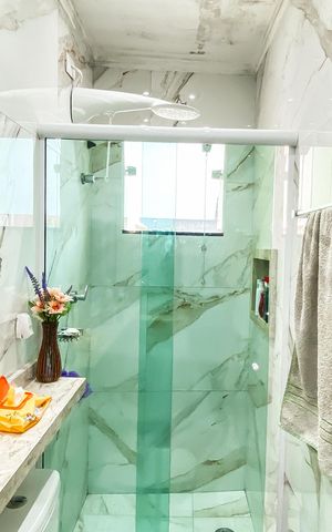 Casa à venda com 83m², 2 quartos e 2 vagas Casa à venda com 83m², 2 quartos e 2 vagasBanheiro da Suíte 1