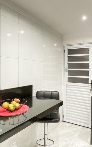 Casa à venda com 83m², 2 quartos e 2 vagas Casa à venda com 83m², 2 quartos e 2 vagasCozinha