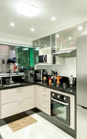Casa à venda com 83m², 2 quartos e 2 vagas Casa à venda com 83m², 2 quartos e 2 vagasCozinha