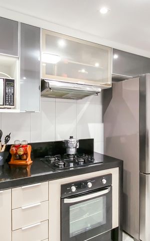Casa à venda com 83m², 2 quartos e 2 vagas Casa à venda com 83m², 2 quartos e 2 vagasCozinha