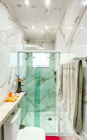 Casa à venda com 83m², 2 quartos e 2 vagas Casa à venda com 83m², 2 quartos e 2 vagasBanheiro da Suíte 1