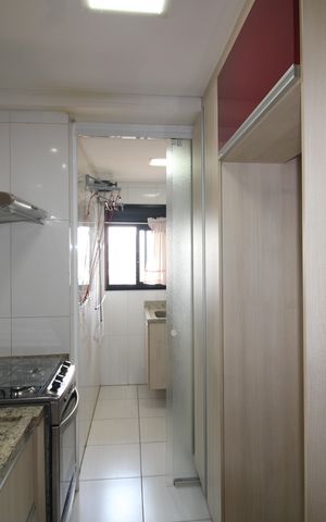 Apartamento à venda com 56m², 2 quartos e 2 vagasSala / Cozinha
