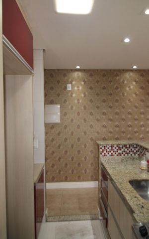 Apartamento à venda com 56m², 2 quartos e 2 vagasSala / Cozinha