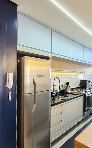 Apartamento à venda com 65m², 2 quartos e 2 vagas Apartamento à venda com 65m², 2 quartos e 2 vagasCozinha e Área de Serviço