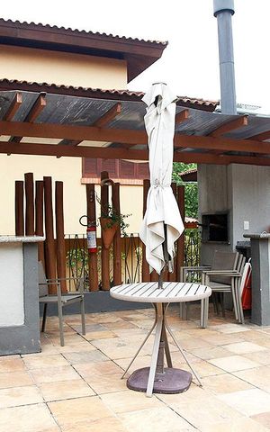 Casa de condomínio para alugar com 230m², 3 quartos e 2 vagasÁrea Comum - Quiosque Churrasqueira