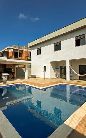 Casa de condomínio à venda com 327m², 5 quartos e 4 vagas