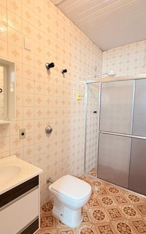 Casa à venda com 174m², 3 quartos e 3 vagasBanheiro Social