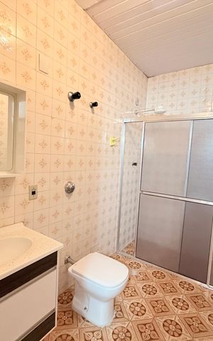 Casa à venda com 174m², 3 quartos e 3 vagasBanheiro Social