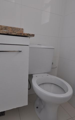 Apartamento à venda com 55m², 2 quartos e 2 vagasBanheiro do Quarto Suíte 