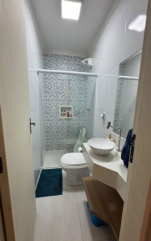Casa à venda com 65m², 2 quartos e 3 vagas Casa à venda com 65m², 2 quartos e 3 vagasBanheiro 1