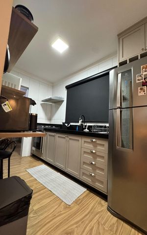 Casa à venda com 65m², 2 quartos e 3 vagas Casa à venda com 65m², 2 quartos e 3 vagasCozinha