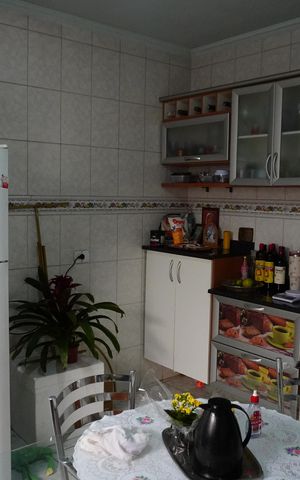 Casa à venda com 184m², 3 quartos e 2 vagasCozinha e Área de Serviço
