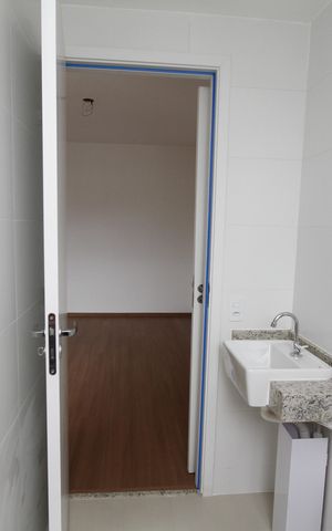 Apartamento à venda com 66m², 2 quartos e 2 vagasBanheiro da Suíte
