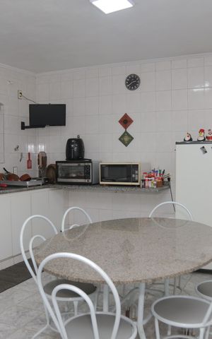 Casa à venda com 500m², 3 quartos e 3 vagas Casa à venda com 500m², 3 quartos e 3 vagasCozinha
