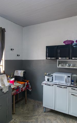 Casa à venda com 150m², 2 quartos e 5 vagas Casa à venda com 150m², 2 quartos e 5 vagasCozinha