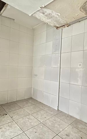 Casa à venda com 70m², 2 quartos e 3 vagas Casa à venda com 70m², 2 quartos e 3 vagasCozinha