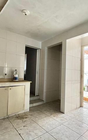Casa à venda com 70m², 2 quartos e 3 vagas Casa à venda com 70m², 2 quartos e 3 vagasCozinha