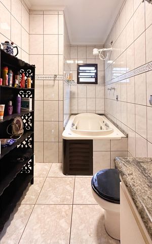 Casa à venda com 230m², 3 quartos e 2 vagas Casa à venda com 230m², 3 quartos e 2 vagasBanheiro da Suíte