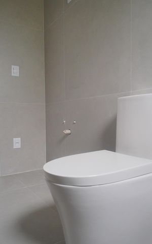 Casa à venda com 118m², 3 quartos e 2 vagasBanheiro
