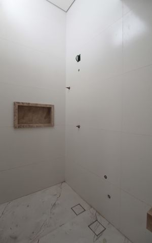 Casa à venda com 122m², 3 quartos e 4 vagasBanheiro Social 1