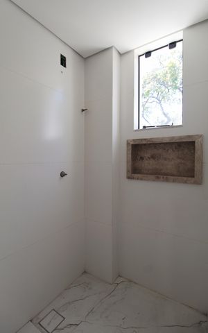 Casa à venda com 122m², 3 quartos e 4 vagasBanheiro da Suite