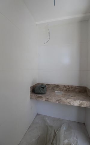 Casa à venda com 122m², 3 quartos e 4 vagasBanheiro da Suite