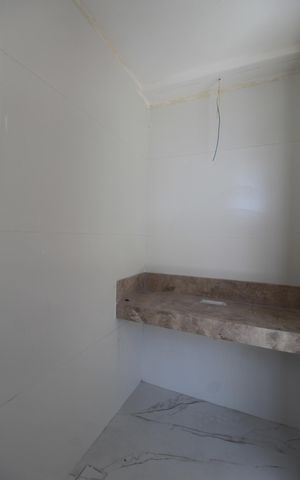 Casa à venda com 122m², 3 quartos e 4 vagasBanheiro da Suite