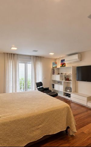 Casa de condomínio à venda com 560m², 4 quartos e 4 vagas Casa de condomínio à venda com 560m², 4 quartos e 4 vagasSuíte 1