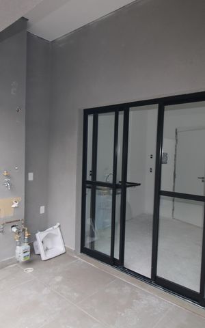 Apartamento à venda com 58m², 2 quartos e 1 vagaSala / Cozinha - Quintal