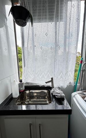 Apartamento à venda com 49m², 2 quartos e 1 vaga Apartamento à venda com 49m², 2 quartos e 1 vagaCozinha e Área de Serviço