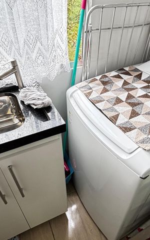 Apartamento à venda com 49m², 2 quartos e 1 vaga Apartamento à venda com 49m², 2 quartos e 1 vagaCozinha e Área de Serviço
