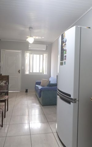 Casa à venda com 48m², 2 quartos e 1 vagaSala/Cozinha