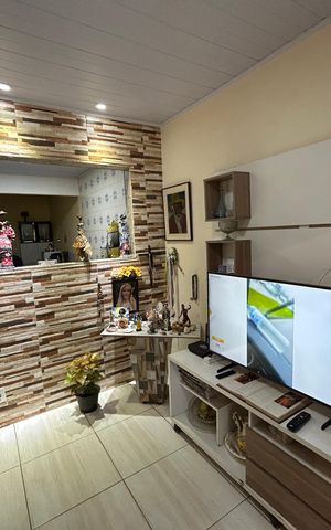 Casa de condomínio à venda com 65m², 2 quartos e 3 vagasSala