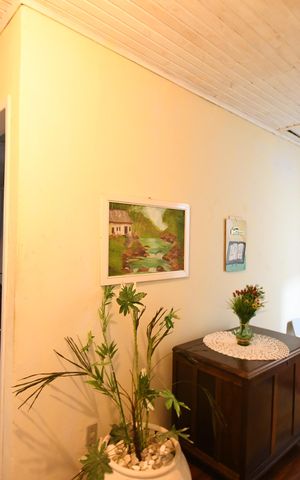 Casa à venda com 55m², 3 quartos e 2 vagasCorredor