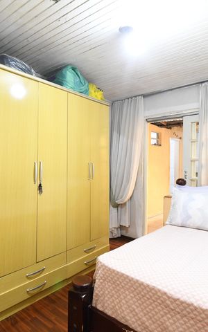Casa à venda com 55m², 3 quartos e 2 vagasSuíte