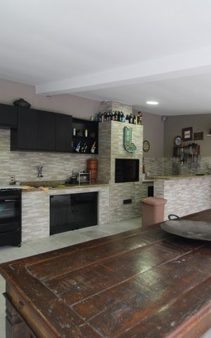 Casa à venda com 400m², 4 quartos e 4 vagasChurrasqueira