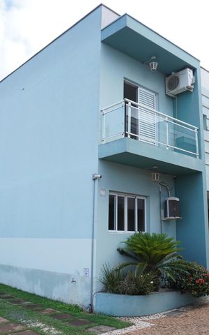 Casa de condomínio à venda com 78m², 2 quartos e 1 vagaFachada de plaquinha PXZV - 1407