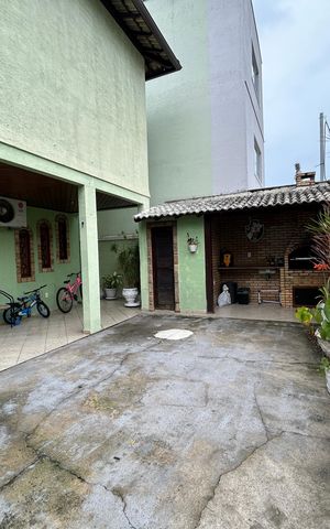 Casa de condomínio à venda com 166m², 3 quartos e 2 vagasQuintal