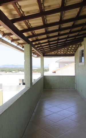 Casa de condomínio para alugar com 120m², 2 quartos e sem vagaVaranda