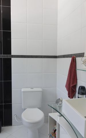 Casa de condomínio para alugar com 120m², 2 quartos e sem vagaBanheiro da Suíte