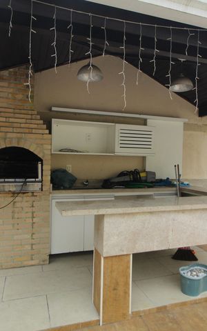 Casa de condomínio à venda com 475m², 4 quartos e 4 vagasÁrea Externa