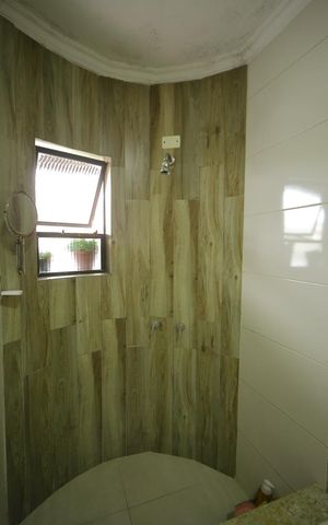 Casa à venda com 232m², 3 quartos e 2 vagasBanheiro da Suíte  