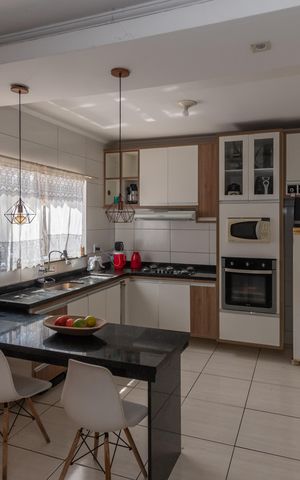 Casa para alugar com 65m², 2 quartos e 2 vagas Casa para alugar com 65m², 2 quartos e 2 vagasCozinha