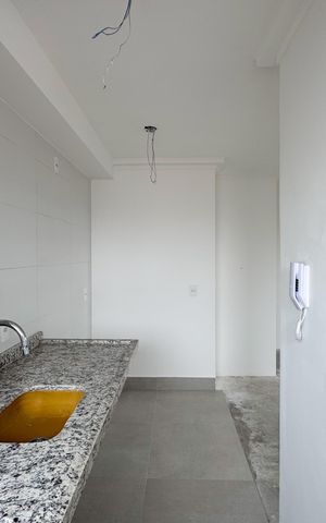 Apartamento à venda com 47m², 2 quartos e 2 vagas Apartamento à venda com 47m², 2 quartos e 2 vagasCozinha
