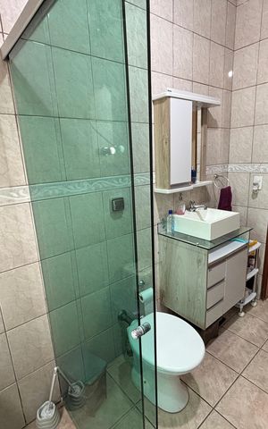 Casa à venda com 280m², 3 quartos e 2 vagas Casa à venda com 280m², 3 quartos e 2 vagasBanheiro