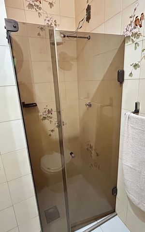 Casa à venda com 260m², 5 quartos e 4 vagasBanheiro da Suíte