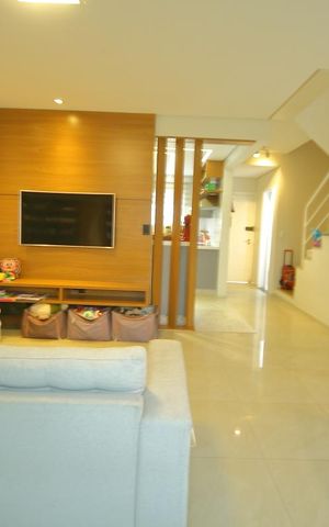 Casa de condomínio à venda com 118m², 3 quartos e 3 vagasSala